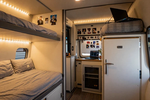 Cozy interior of a long-haul sleeper cab serving as a truck driver's home on the road